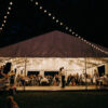 Wedding marquee at night with couple on dance floor