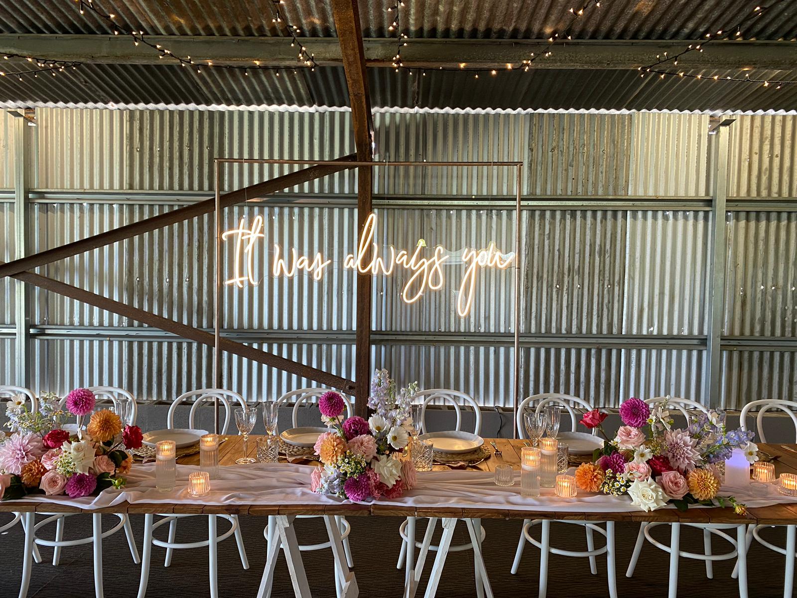 Rustic Timber Tables and Florals with White Bentwood Chairs for Wedding Reception