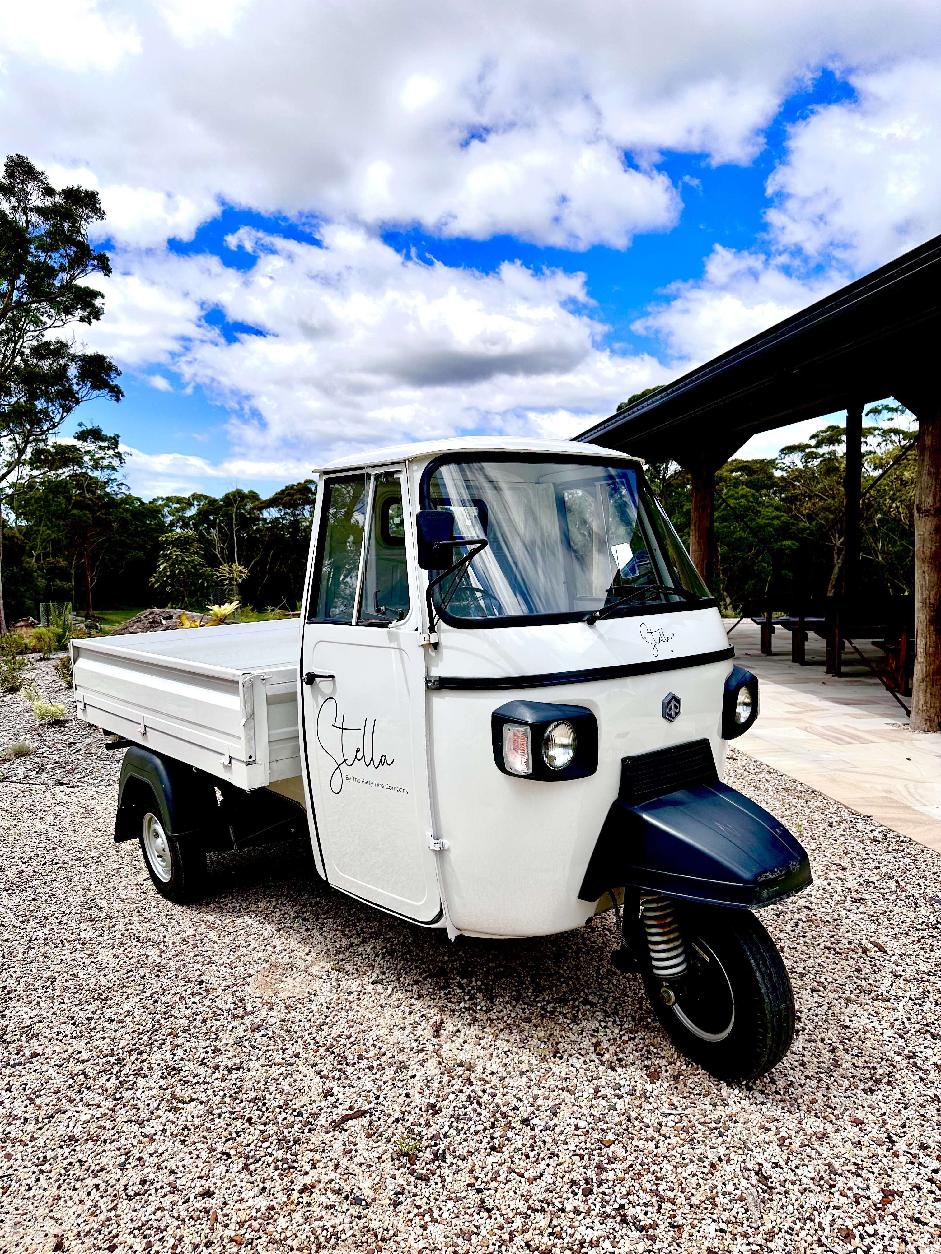Stella the Piaggio Ape Hospitality Vehicle in Garden Setting