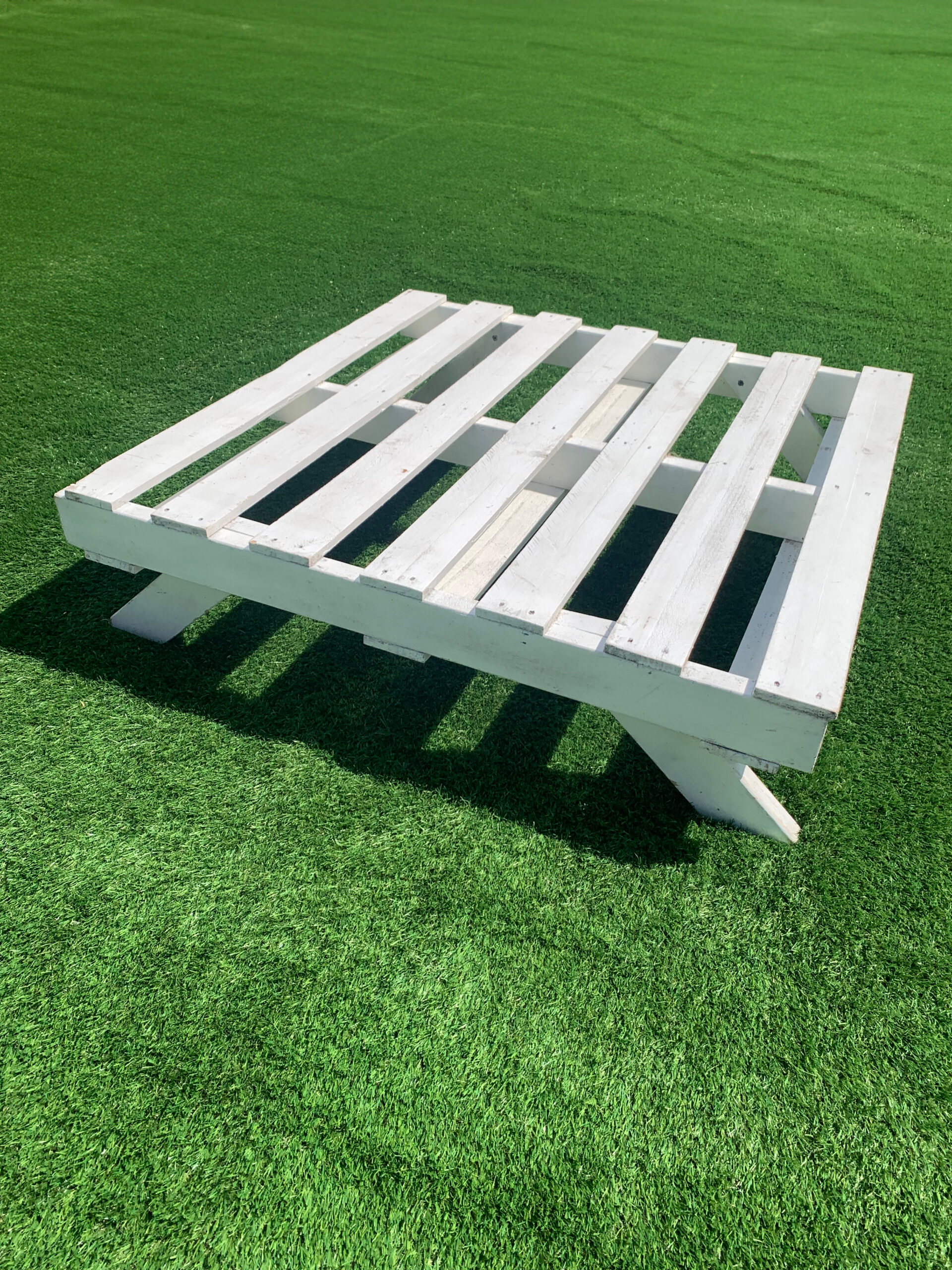 White Pallet Picnic Table on grass