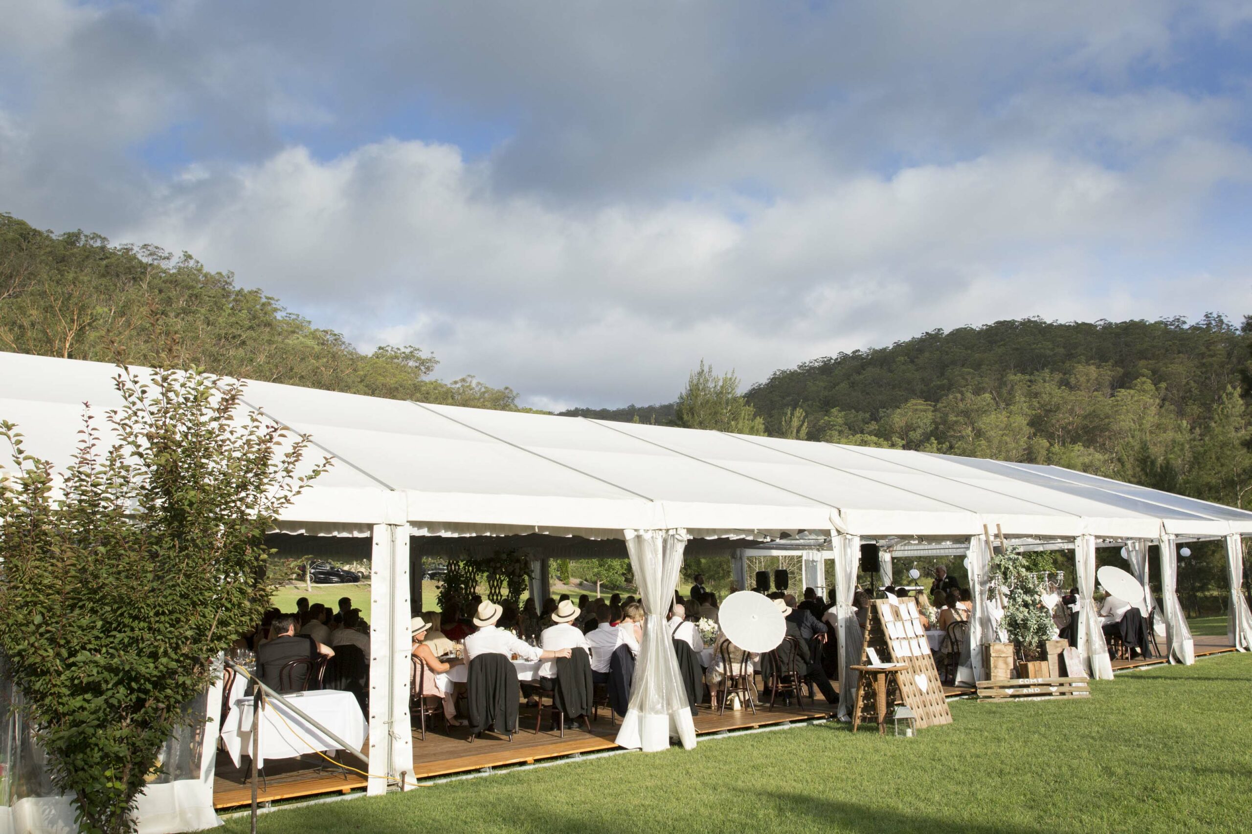 White marquee with integrated flooring for wedding